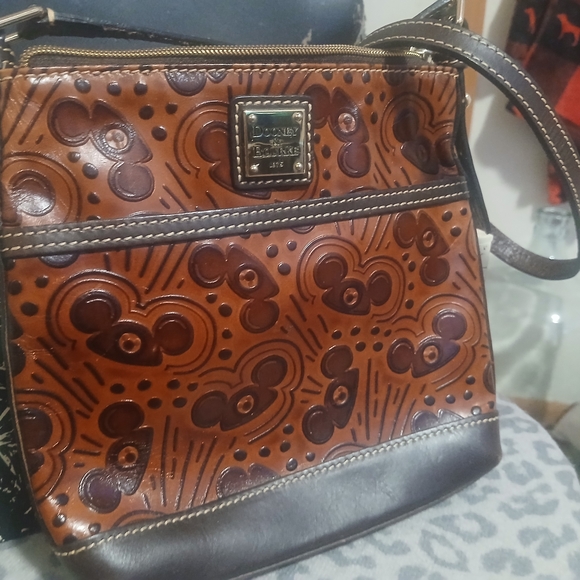 Dooney & Bourke Handbags - Dooney & Bourke Embossed Brown Crossbody Bag